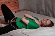 Shibari jute karada in green shirt and black leggings