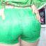 Sonja oiling and rinsing herself in the shower wearing a supersexy green shiny nylon shorts and rain jacket (Pics)