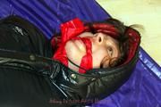Alina tied and gagged in shiny down clothes