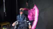 Sexy Ajyana being tied, gagged, hooded and dominated by Stella wearing sexy shiny nylon rainwear on a hairdresser´s chair Part 2 of 2 (Video)