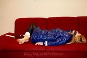 Samantha bound and gagged in a shiny nylon down coat