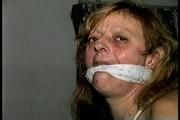 43 YEAR OLD WAITRESS IS MOUTH STUFFED, CLEAVE GAGGED,  HOG-TIED, BAREFOOT , TOE-TIED  AND PANTIE-LESS (D68-6)