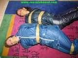 Get 567 pictures from  Stella and Leoni tied and gagged in shiny nylon Rainwear from 2005-2008 in one package!