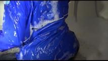 Sonja taking a bath and ties and gagges herself wearing a shiny nylon rainwear combination (Video)