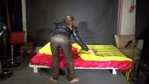 Sexy Sandra preparing her bed wearing sexy shiny nylon downwear (Video)