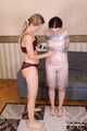 Bekki and Kelly - Sisters are taped and wrapped together face to face