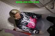 SEXY SONJA wearing a sexy shiny nylon rainwear combination having fun in the bathtub and in the shower (Pics)