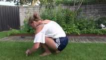 Watching sexy SANDRA wearing a darkblue/white striped  shiny nylon shorts and a top while gardening outdoor (Video)