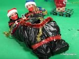 [From archive] Masha More and Malika - packed in trash bags with red duct tape like New Year presents 03