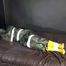 Watching sexy Pia being tied and gagged with tape on a bed wearing a sexy camouflage shiny nylon rainpants and a rainjacket as well as yellow rubber boots (Video)