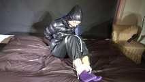 Ronja being tied and gagged with ropes and a ballgag in shiny nylon rainwear and downwear (Video)