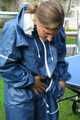 Watch Sandra playing table tennis in her shiny nylon Rainwear