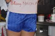 Watching sexy Pia wearing a sexy blue shiny nylon shorts and a tshirt doing her housework (Pics)