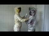 Get 2 Videos with Alina enjoying her Shiny Nylon Rainwear together with a Friend from our 2010 Archive