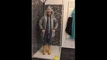 Lady in AGU rainwear and transparent raingear under the shower