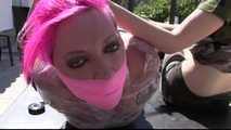 Nova Pink - Outdoor Hogtie Mummification Challenge in sunny Spain