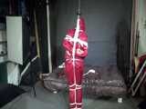 Watch Sandra beeing bound gagged and pantyhooded in her shiny nylon Rainwear