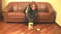 [From archive] Stella - taped sitting with yellow duct tape and packed into trash bag (video)