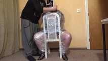 Foiled on a chair and tickled