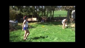 Jill and a friend of her playing soccer wearing sexy shiny ynlon shorts and a top (Video)