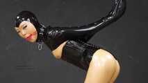 Gagged rubber doll in monogloves