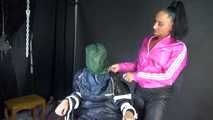 Sexy Ajyana being tied, gagged, hooded and dominated by Stella wearing sexy shiny nylon rainwear on a hairdresser´s chair Part 2 of 2 (Video)