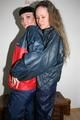 Jill and Petra touching eachother while wearing shiny nylon rainwear (Pics)