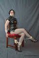 Relaxing in ropes and PVC cheongsam