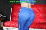 Sexy Sonja being tied and gagged overhead with ropes wearing a sexy blue shiny nylon pants and a jacket (Pics)