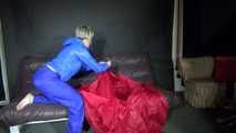 Sexy Sonja changing clothes wearing a sexy blue rainwear combination and preparing her sofa (Video)