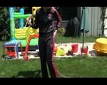 Pia wearing a sexy black/pink adidas sweat suit while watering the flowers in the garden (Video)