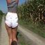 Watch Chloe taking a walk with her shiny nylon Shorts
