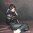 Watching sexy SONJA wearing a sexy black shiny nylon rain pants and a black shiny nylon down jacket being tied, gagged and hooded with ropes and a cloth gag on a bed (Pics) 