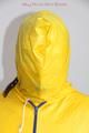 Jill tied and gagged on a chair wearing a yellow rainsuit and coveres with an yellow raincoat with two hoods (Pics)