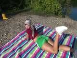 Watch Chloe enjoying her Shiny nylon Shorts in Nature