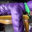 Watching Sonja wearig a sexy blue rainpant and a purple down jacket being tied, gagged and hooded on a stool with ropes and a cloth gag (Video)