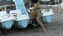 016220 Eve Pees On The Pedalo