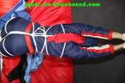 Sonja tied and gagged overhead with ropes and a ballgag wearing a sexy shiny nylon oldschool downbib (Pics)