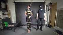 Myxxxy bound and gagged in a shiny nylon Catsuit