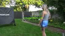 Watch Maly in her shiny nylon Shorts enjoying the warm Weather in the Garden