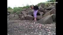 007001 Kim Takes Her First Pee Of The Day On The Rocky Beach