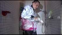 Mara wearing a sexy rainwear combination for taking a shower with shaving cream (Video)