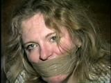30 Yr OLD SINGLE MOM GETS PANTIES STUFFED IN HER MOUTH, TIGHTLY WRAP TAPE GAGGED AND TIED UP ON THE BED (D49-7)