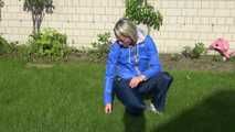 watch Sonja taking care of the garden enjoying her shiny nylon rainpants and her nylon windbreaker!