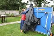 Watch Sandra in the Garden wearing a Rainskirt and Rainjacket