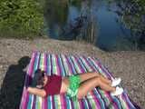 Watch Chloe enjoying her Shiny nylon Shorts in Nature