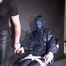 Watching sexy Aiyana being tied, gagged, dominated and hooded from dark temptation wearing sexy shiny nylon rainwear (Video)