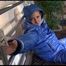 Mara tied, gagged and hooded on bed with cuffs wearing a sexy blue downwear combination (Video)