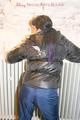 Jill tied and gagged on a heater wearing a shiny black down jacket and a darkblue rain pants (Pics)