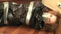 [From archive] Stella - hogtaped and packed into the trash bag (video)